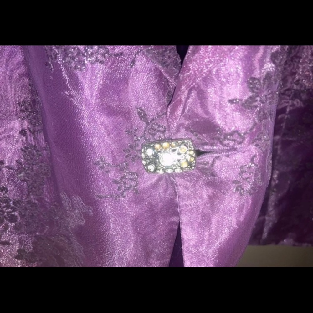 Purple embroidered light jacket w/rhinestone chips to add dazzle. Attention got!